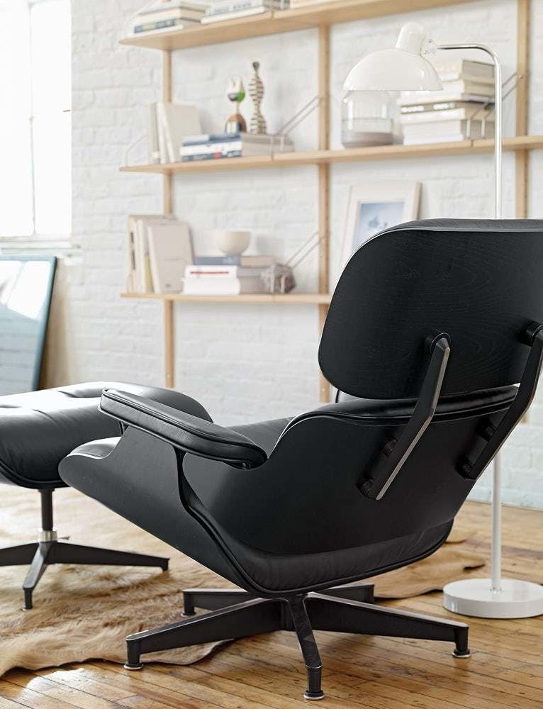Sillón Lyra Cuero Negro con Ottomano