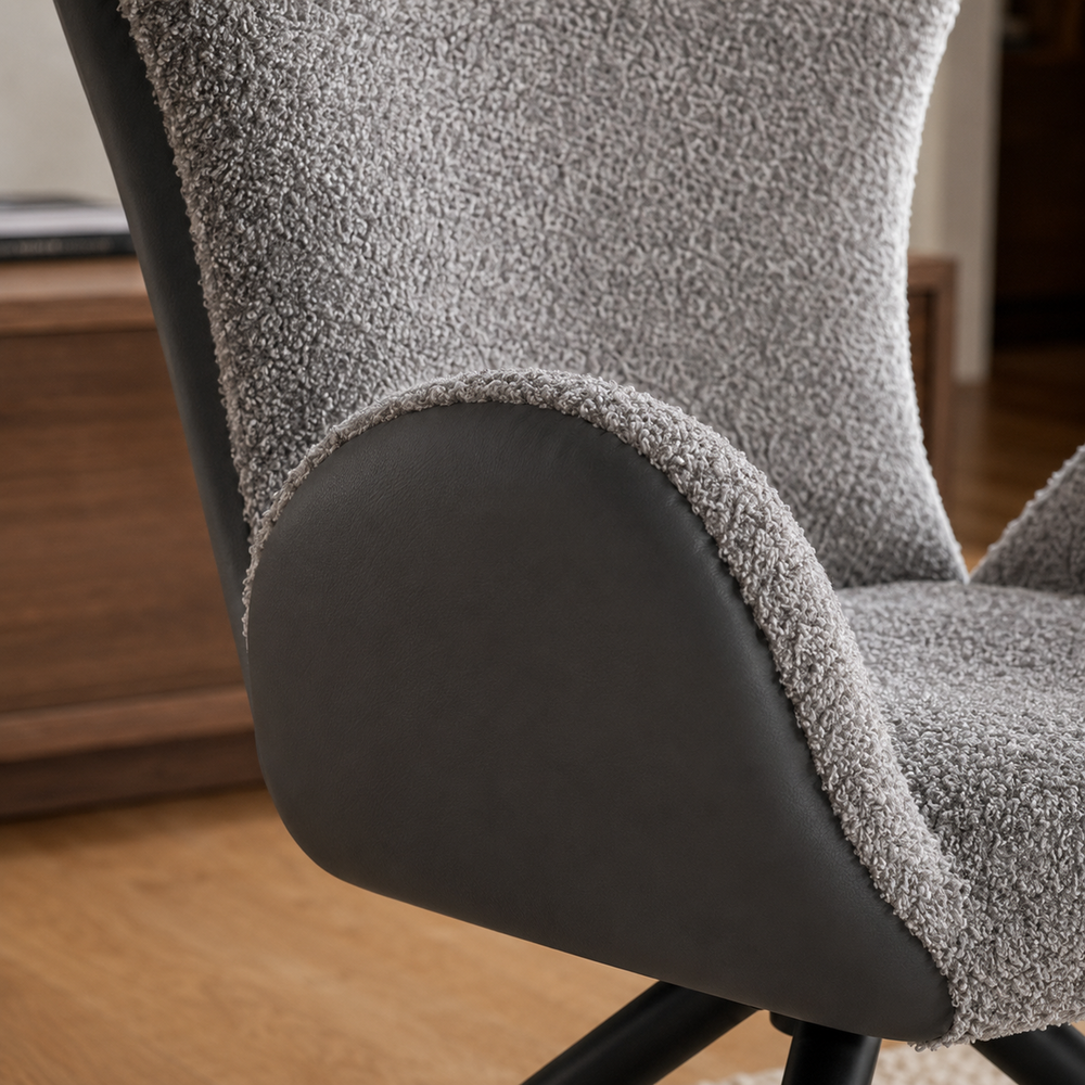 Detalle del tapizado del Sillón Niva donde se aprecia el contraste entre el boucle texturizado y el ecocuero liso.